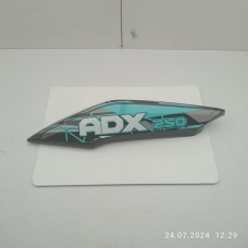 Пластик под сидением задний левый (чёрн. синяя наклейка) ADX250